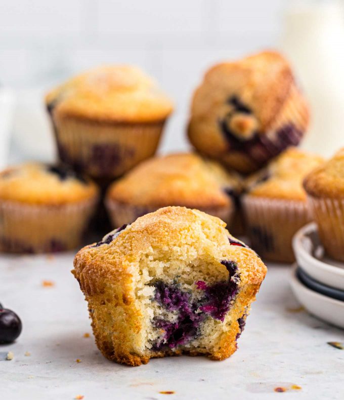 blueberry muffin with a bite taken out of it