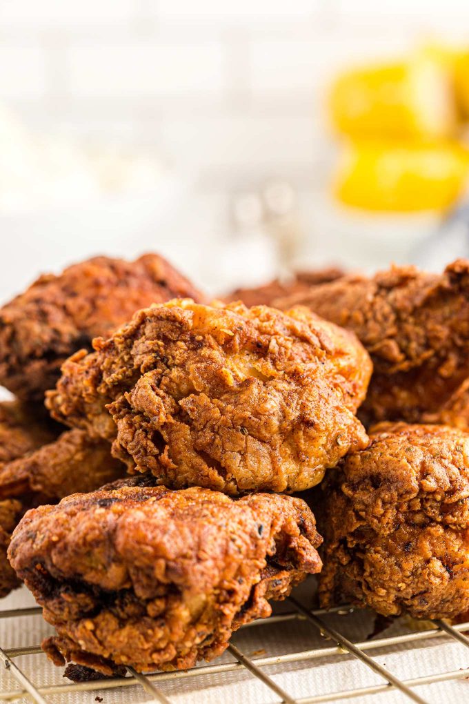 This Classic Buttermilk Fried Chicken recipe is incredibly flavorful and juicy, from a hot sauce/buttermilk marinade and a seasoned flour dredge.  Soon to be your family's new favorite chicken recipe! #chicken #fried #buttermilk #friedchicken #southern #chickenrecipes #dinner
