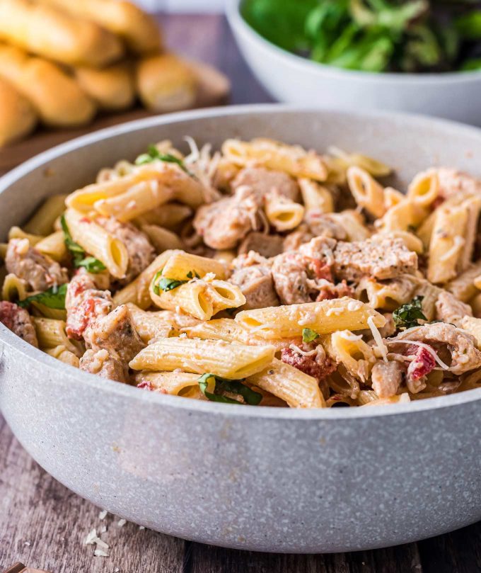 grey bowl with sun dried tomato pasta