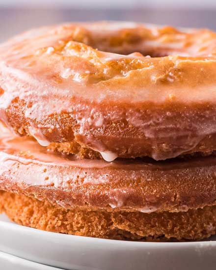 Golden brown on the outside and soft and fluffy on the inside, these Old Fashioned Sour Cream Donuts are made with simple ingredients and NO yeast!  Perfectly fried with nooks and crannies to hold the sweet vanilla glaze! #donuts #cakedonuts #oldfashioned #sourcream #baking #breakfast #pastry