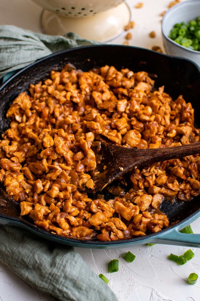 ginger garlic chicken with peanuts in skillet