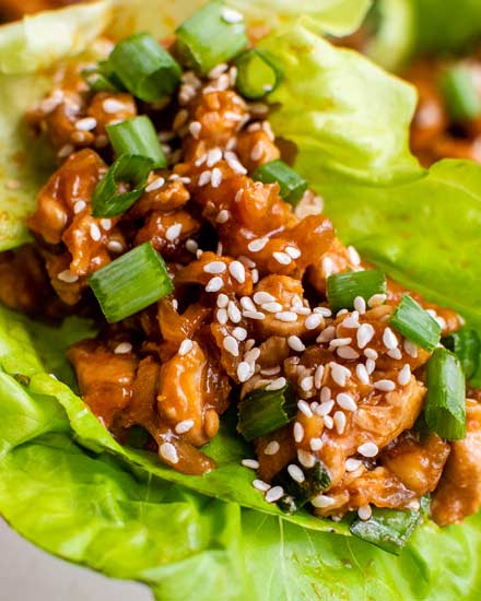 These easy Asian-Style Chicken Lettuce Wraps are SO flavorful, and perfect as a simple dinner recipe, or an appetizer for a party! #chicken #asian #chinese #lettucewraps #lettucecups #chickendinner #dinner #lunch #appetizer #party