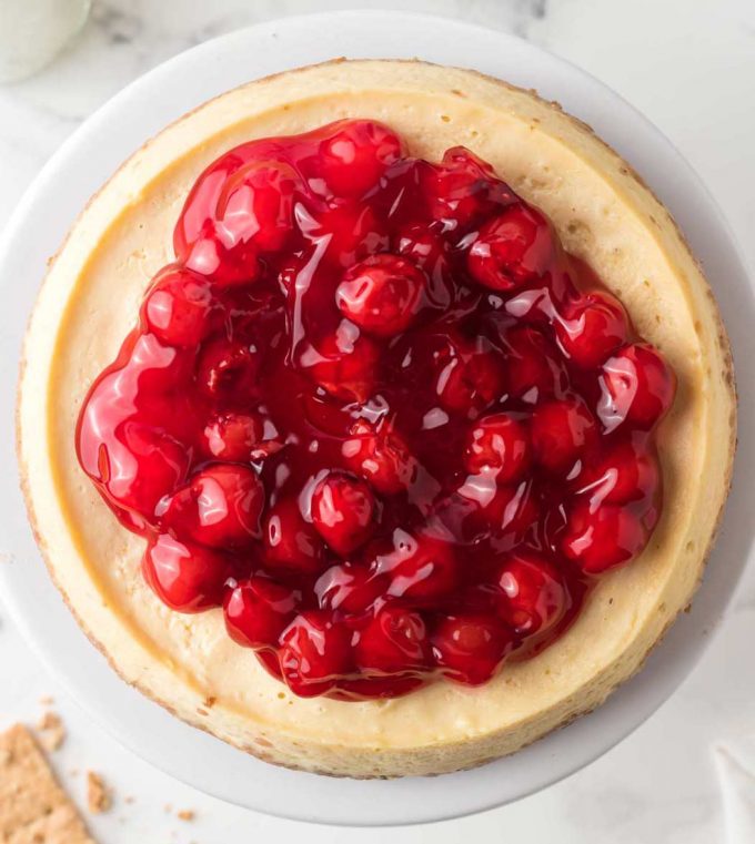 instant pot cheesecake topped with cherries