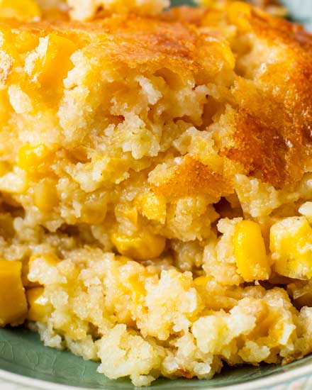 This easy Corn Casserole is a delicious recipe made with sweet corn, cornbread mix, eggs, milk, butter and sugar. Absolutely the perfect side dish for the holidays or family dinner, made with simple, staple ingredients! #corncasserole #cornpudding #jiffycorncasserole #sidedish #side #holidays #thanksgiving #corn   
