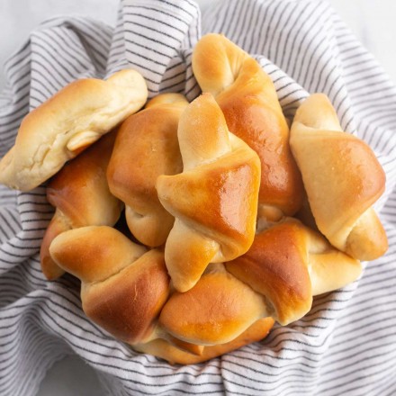 bread basket filled with crescent rolls