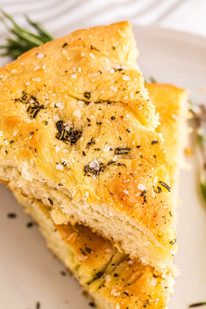 two slices of rosemary focaccia on top of each other