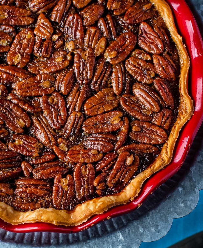 bourbon pecan pie in red pie pan