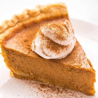 My Classic Pumpkin Pie is velvety smooth and creamy, perfectly spiced, and so easy to make! The perfect dessert for the holidays, and the only pumpkin pie recipe you'll need. #pumpkin #pumpkinpie #pie #dessert #baking #fromscratch #libby #thanksgiving #holidays