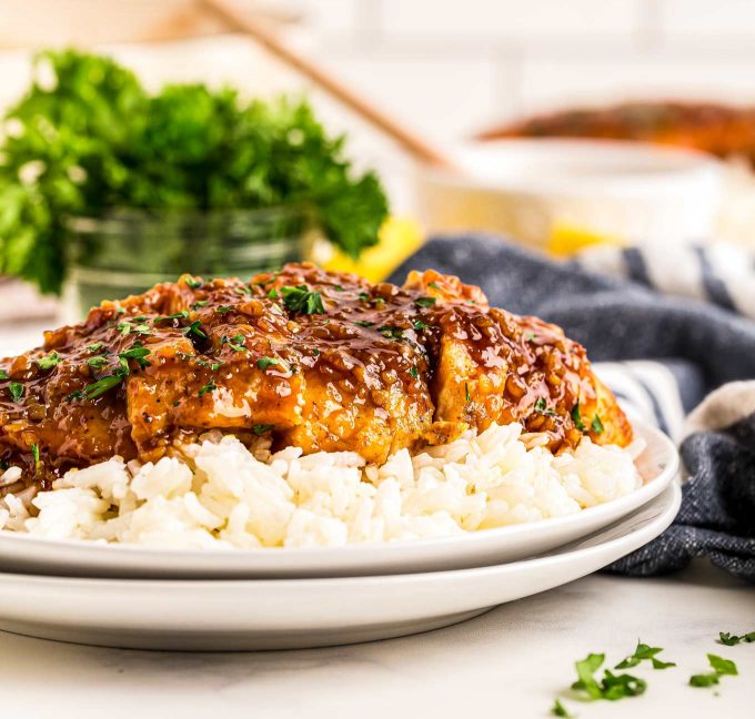 sliced honey garlic chicken on rice