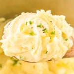 wooden spoonful of creamy mashed potatoes