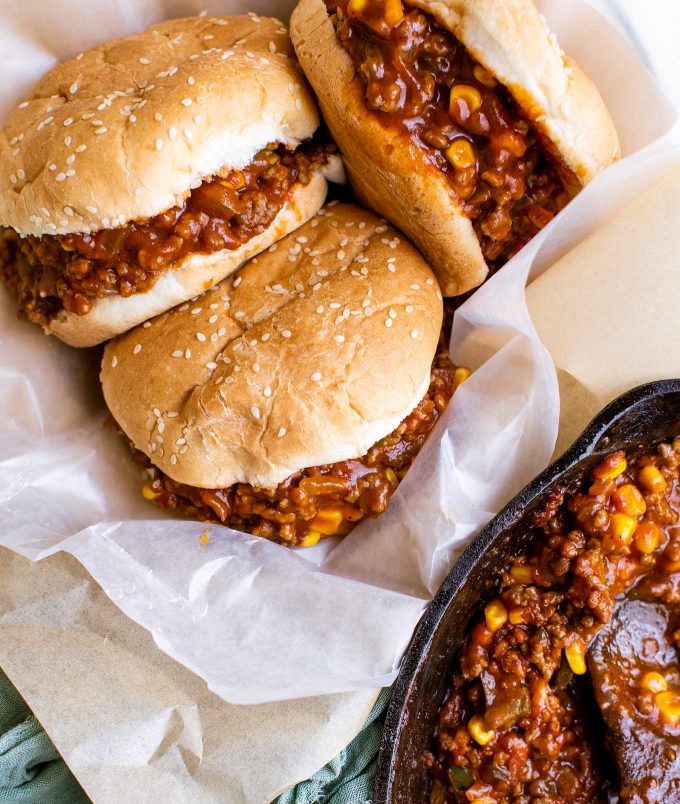 Perfect for a quick dinner, these Tex-Mex Sloppy Joes are ready in 30 minutes or less!  Made with beef, jalapenos, corn, and zesty spices, these sloppy joes will soon become a new family favorite! #sloppyjoes #texmex #easyrecipe #dinner #kidfriendly #sandwich #onepan #weeknight