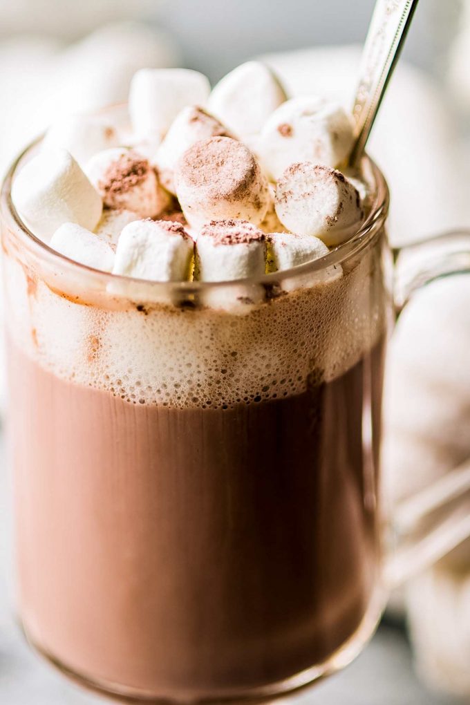 frothy mug of hot cocoa with marshmallows on top