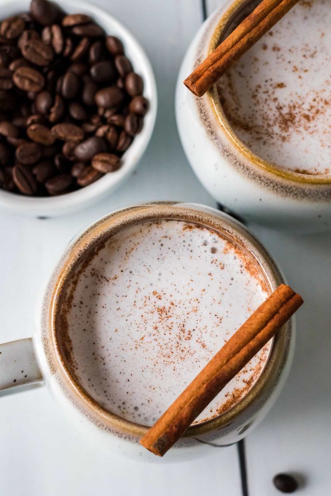 maple lattes in mugs from overhead view