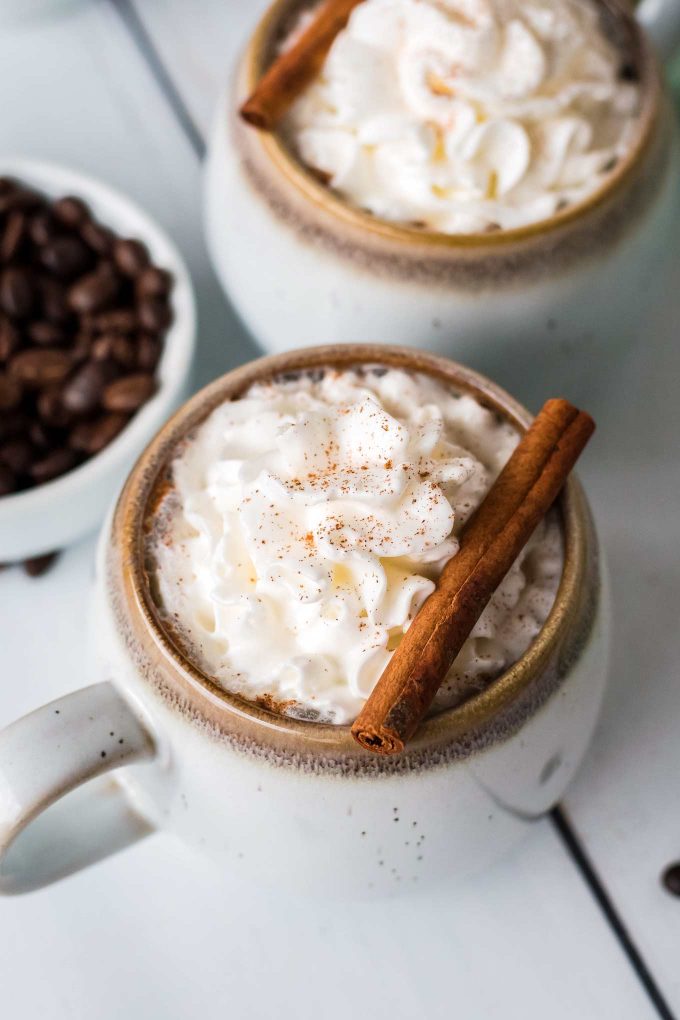 cinnamon latte with whipped cream on top