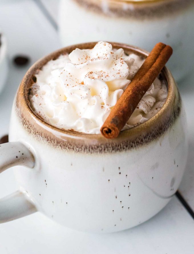 Get a quick energy boost by whipping up this delicious Maple Cinnamon Latte!  Easy to make at home with tips for making your own steamed milk/foam and coffee instructions in case you don't have access to espresso. #latte #maple #cinnamon #coffee #homebrew #coffeeshop #homemade #easyrecipe