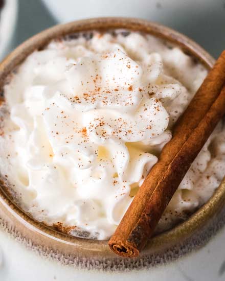 Get a quick energy boost by whipping up this delicious Maple Cinnamon Latte!  Easy to make at home with tips for making your own steamed milk/foam and coffee instructions in case you don't have access to espresso. #latte #maple #cinnamon #coffee #homebrew #coffeeshop #homemade #easyrecipe