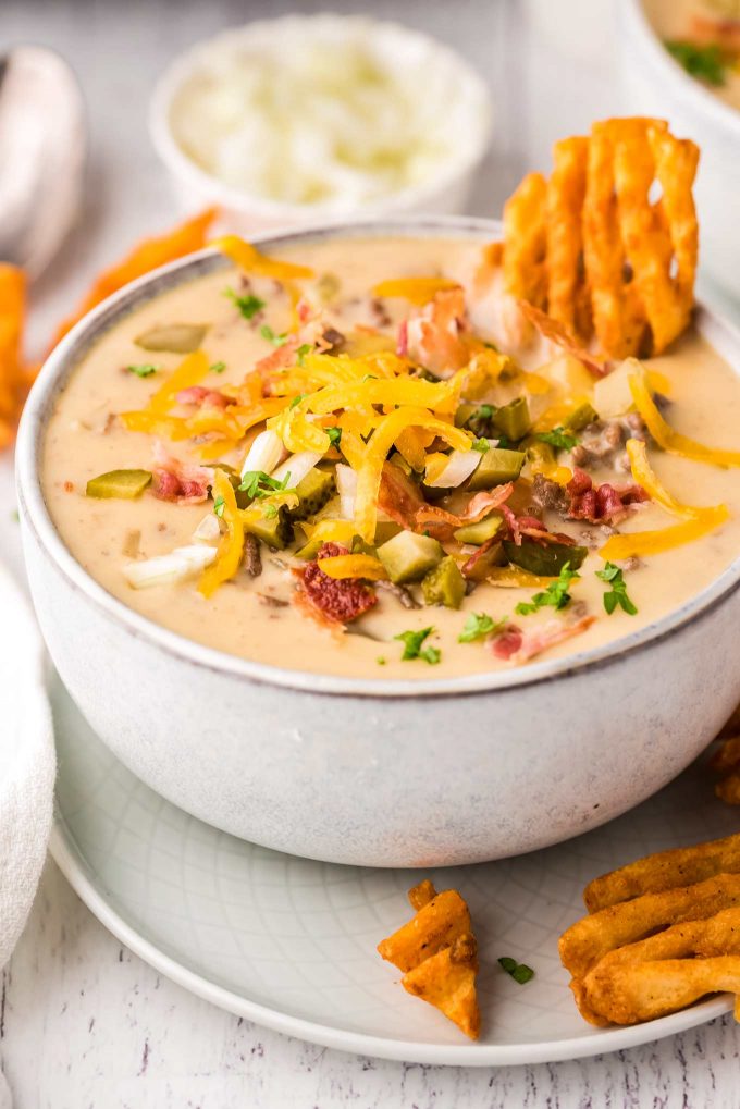 bowl of cheeseburger soup with waffle fry