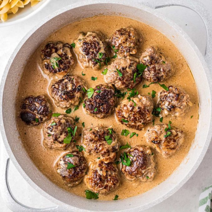 swedish meatballs in gravy in pan