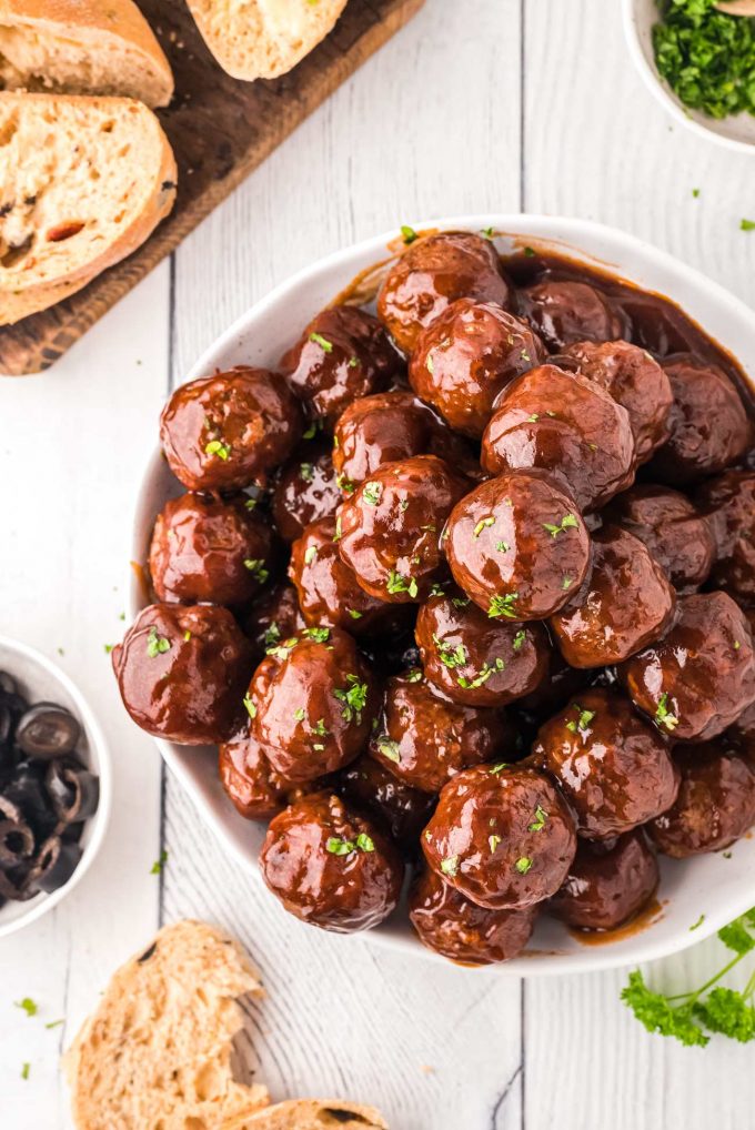 pile of meatballs in white bowl for a party