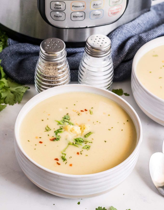 two bowls of cauliflower soup by instant pot