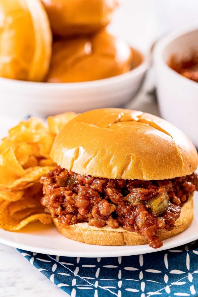 These absolutely delicious ground turkey sloppy joes are made in one skillet and ready in less than 30 minutes!  Homemade yet easy to make, this is a family-friendly dinner that you can even make ahead of time. #sloppyjoes #turkey #groundturkey #dinner #kidfriendly #weeknight #healthier #easyrecipe