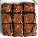 sliced brownies on parchment paper