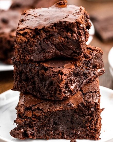 These Classic Fudgy Brownies are made with BOTH cocoa powder and chocolate. Made right in the saucepan, you won't believe how easy it is to make brownies from scratch with dense fudgy centers and shiny, crackly tops! #brownies #dessert #fudgy #fromscratch #dessertrecipes