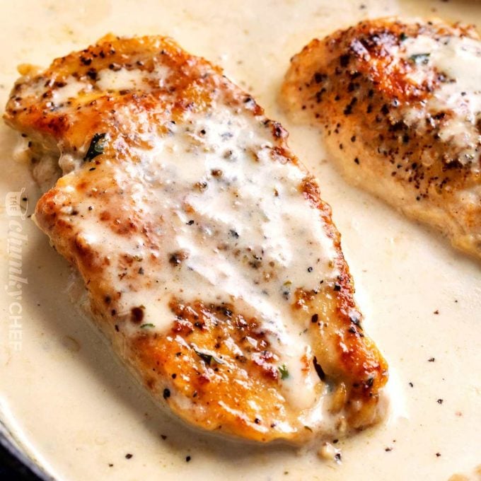 chicken in pan with sauce