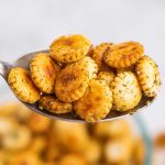 spoonful of seasoned oyster crackers with dill