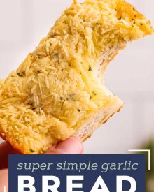Homemade garlic bread is so simple to make! Complete with crispy edges, buttery and soft middles and plenty of garlic and herb flavor. Frozen bread doesn’t stand a chance against this garlic bread! #garlicbread #garlic #bread #easyrecipe #homemade #cheesy #cheesybread #italian