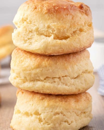 Learn how to make the BEST Buttermilk Biscuits from scratch! They're so light and flaky, and plenty fluffy. Perfect for topping with sausage gravy, butter, honey or jam! #biscuits #biscuitrecipe #buttermilkbiscuits