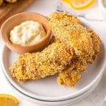 pile of baked fish sticks on plate