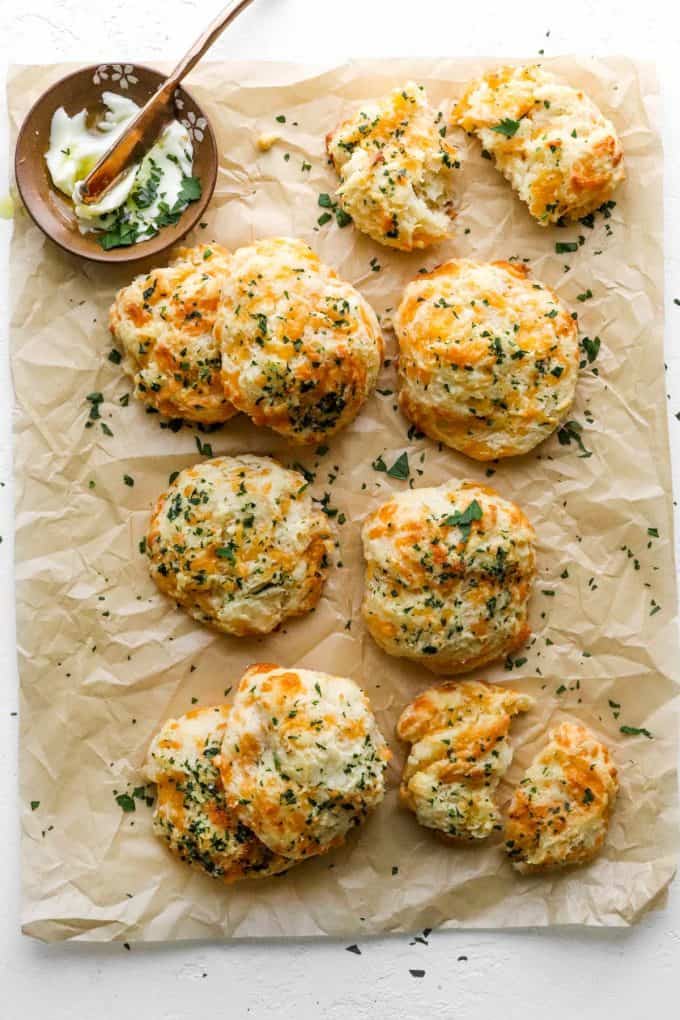 batch of cheddar bay biscuits on parchment paper