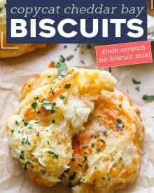 These Copycat Cheddar Bay Biscuits are buttery, garlicky, cheesy, fluffy, and ready in less than 30 minutes! No rolling and cutting needed and they're made from scratch. #biscuits #cheddarbay #copycat #redlobsterbiscuits