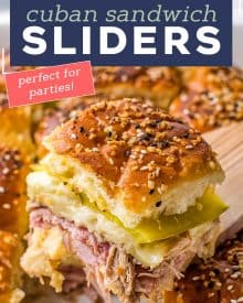 These Cuban Sliders are a fun appetizer version of the classic Cuban sandwich! Loaded with ham, pulled pork, mustard sauce, cheese and pickles, you'll love every bite of these delicious crowd-pleasing sliders. #sliders #cuban #ham #pork #appetizers #fingerfoods #partyfood