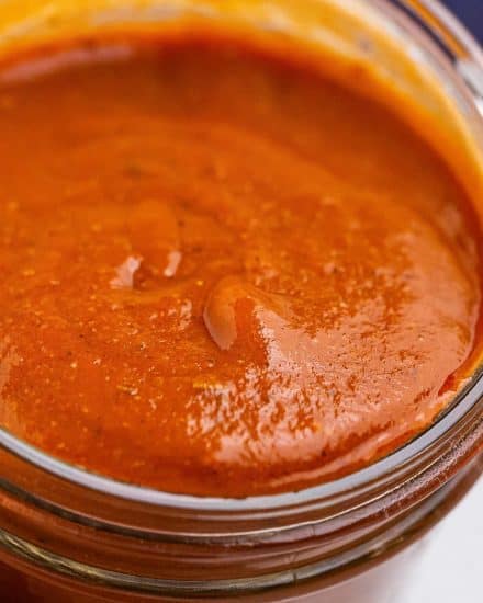 This easy Homemade Red Enchilada Sauce is made with simple pantry ingredients and ready in about 15 minutes! Once you try homemade, you won't ever want to buy enchilada sauce again. #enchiladasauce #enchiladas #homemade #pantryrecipe #mexican