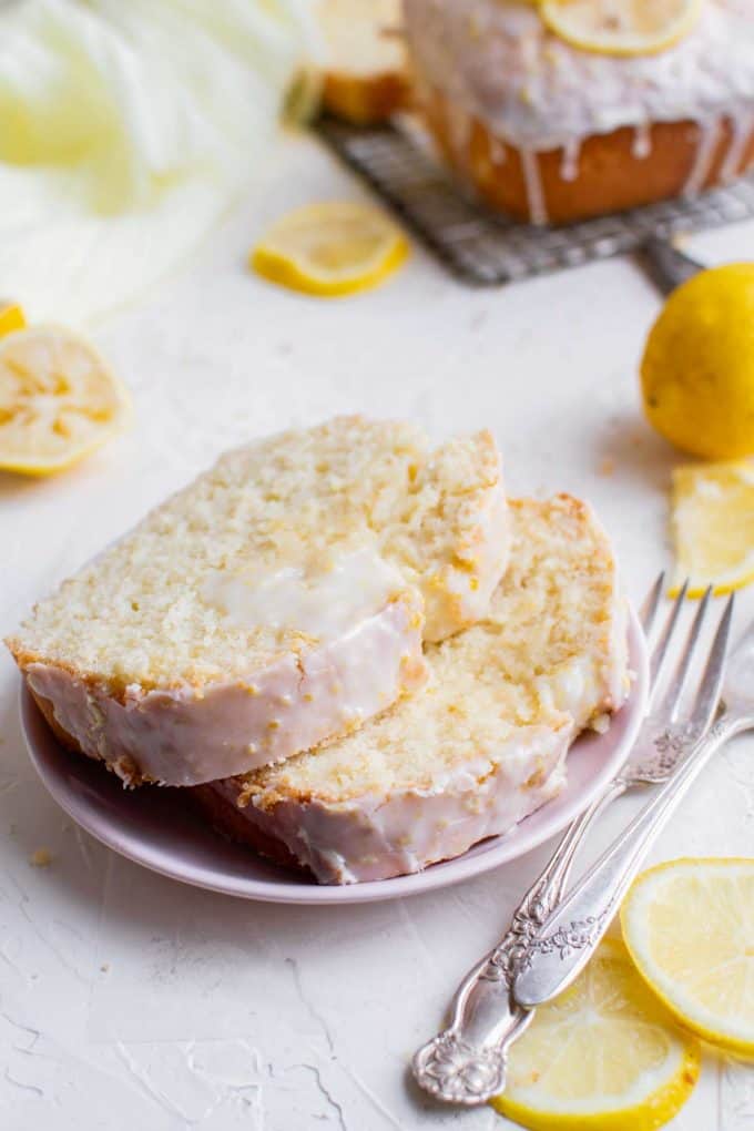 This moist and fluffy Lemon Pound Cake is so easy to make from scratch, and absolutely bursting with bright lemon flavors! The sweet lemon glaze really takes this cake over the top. If you're a fan of Starbucks Lemon Loaf, this lemon pound cake is for you! #poundcake #lemon #dessert #loaf #cake #fromscratch