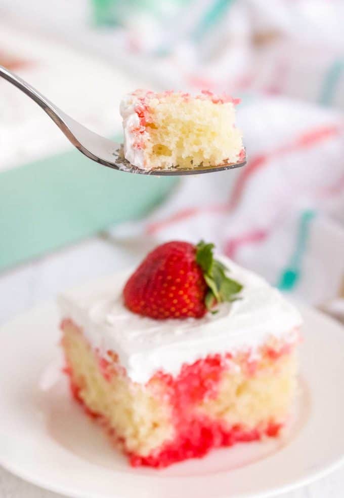 bite of poke cake on fork