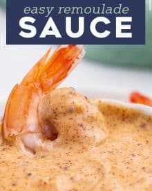This Cajun-Style Remoulade Sauce is a creamy and ultra flavorful sauce with a glorious kick of spicy Cajun flavors. Perfect for crab cakes, shrimp, fries, fried pickles and more! #remoulade #sauce #cajun #creole #seafood