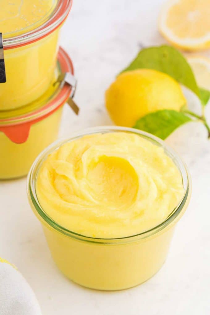 This recipe for an easy, yet Classic Lemon Curd is perfectly tart, smooth and oh so creamy. It's perfect for spreading on toast, using as a filling, or just eating by the spoonful! #lemon #curd #dessert #baking