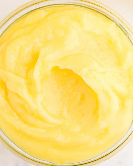 This recipe for an easy, yet Classic Lemon Curd is perfectly tart, smooth and oh so creamy. It's perfect for spreading on toast, using as a filling, or just eating by the spoonful! #lemon #curd #dessert #baking