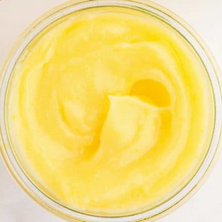 creamy lemon curd in glass container