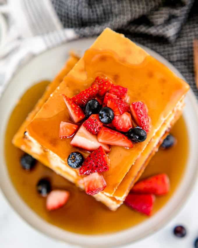 stack of pancakes with berries on top