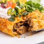 forkful of beef enchiladas