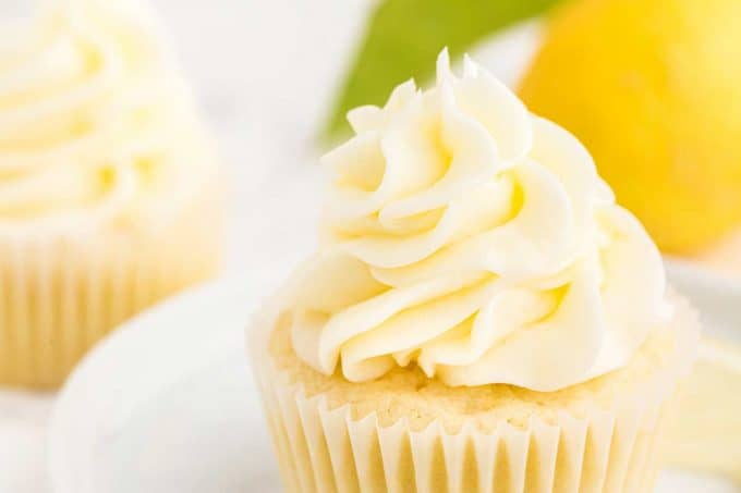 lemon cupcakes with lemon buttercream frosting on top