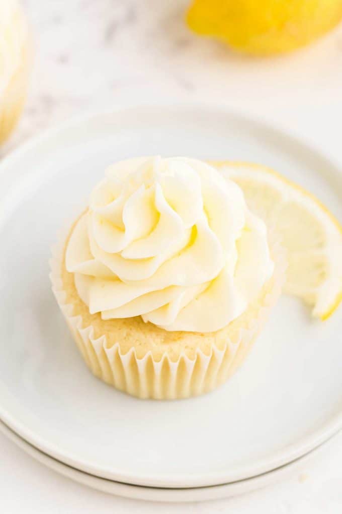 swirl of lemon frosting on cupcake