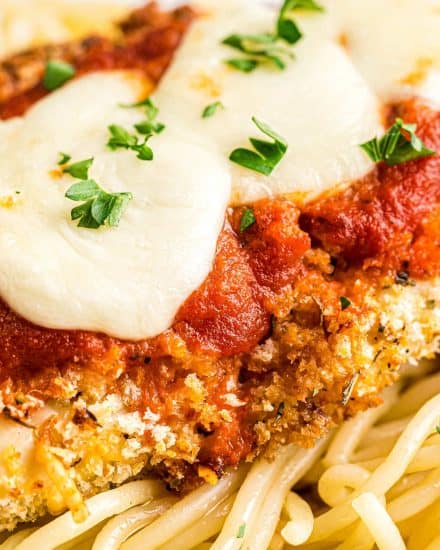 This Air Fryer Chicken Parmesan is made super easily with a handful of ingredients, uses less oil, and no messy pan-frying! Air fryer and oven instructions included. #airfryer #chickenparmesan #chickenrecipes