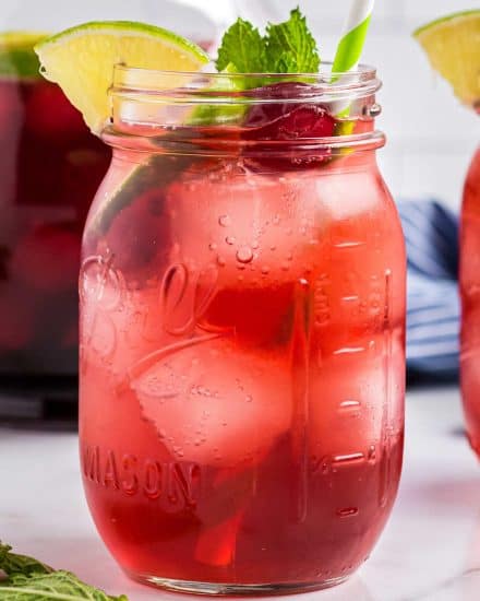 This refreshing non-alcoholic Tart Cherry Limeade is made with simple ingredients, makes a large batch, and the recipe has plenty of options for substitutions! #drink #summer #cherry #limeade