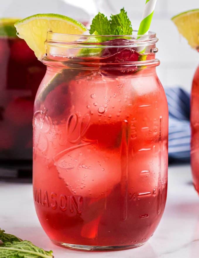 This refreshing non-alcoholic Tart Cherry Limeade is made with simple ingredients, makes a large batch, and the recipe has plenty of options for substitutions! #drink #summer #cherry #limeade