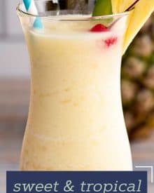 This Frozen Pina Colada is sweet, tropical, and perfect for a hot summer day! Easy to substitute with alternate rums, or even make it a virgin mocktail. #pinacolada #frozencocktail